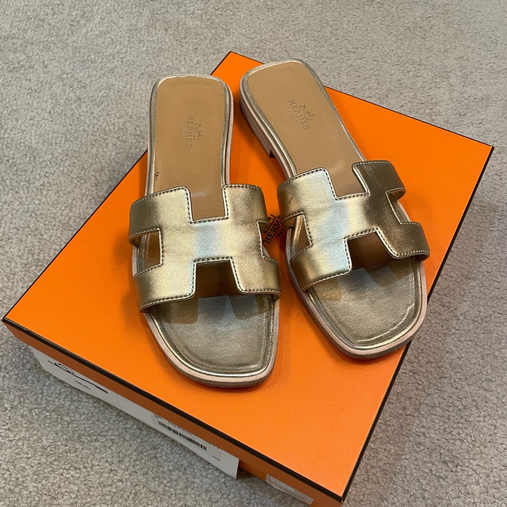 HERMES ORAN SANDALS - Gold
